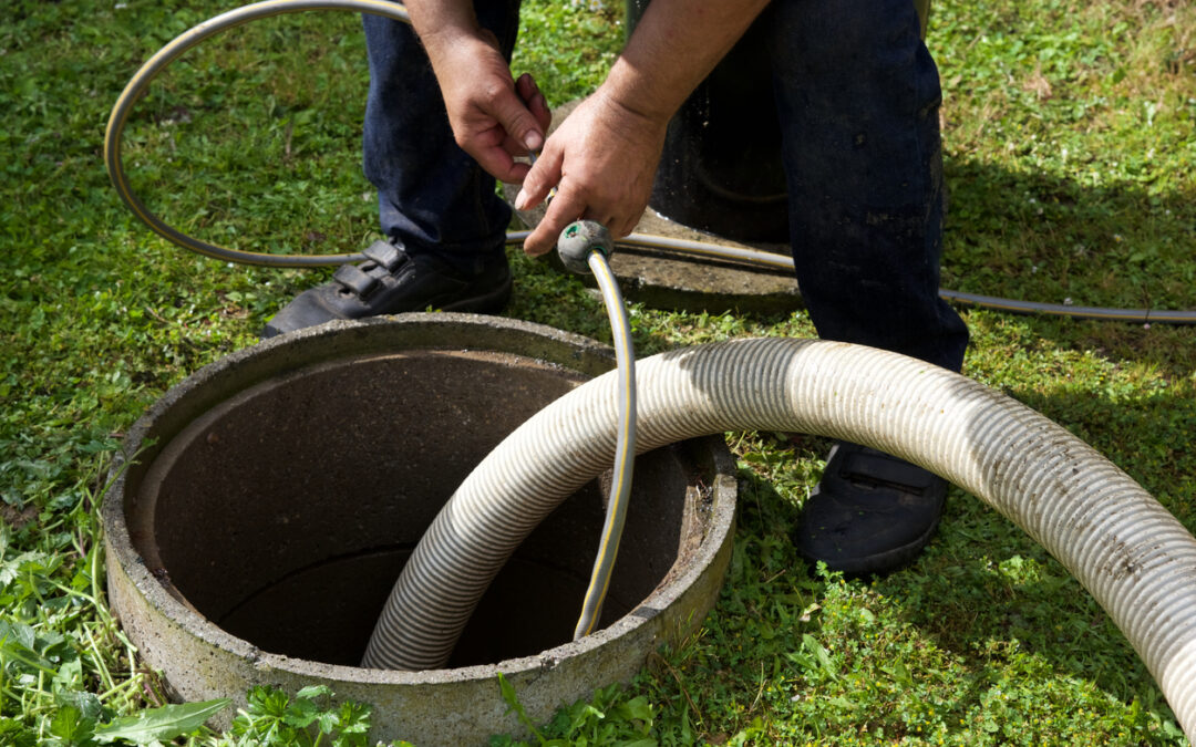 the removal of sewage sludge and cleaning of a residential septic tank